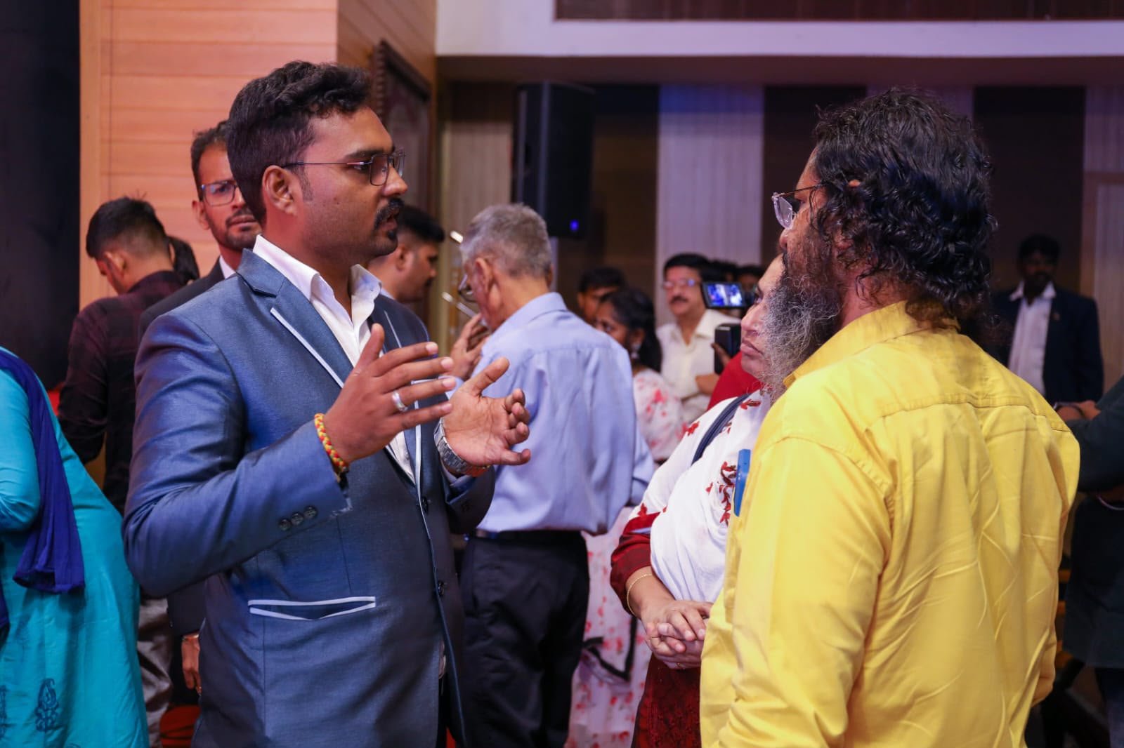 Speaker addressing the 14th anniversary gathering